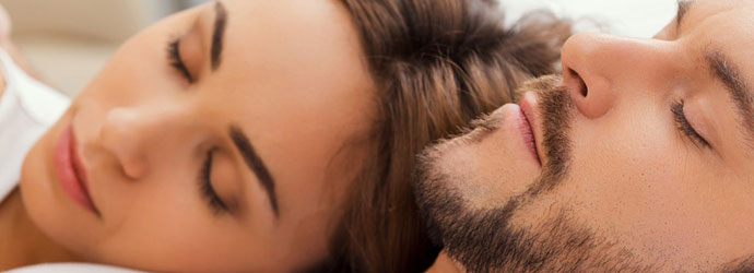 couple-sleeping-header